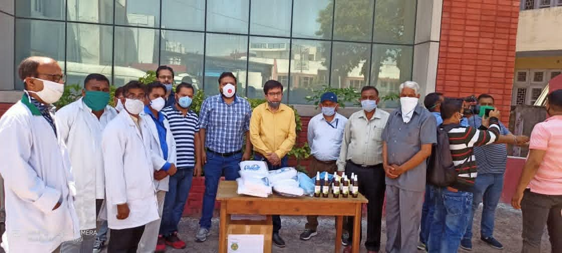 Senior citizens receiving free medical consultation and vital checks